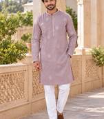 Graceful dusty pink linen kurta pyjama set with elegant embroidery