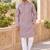 Graceful dusty pink linen kurta pyjama set with elegant embroidery