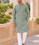Refreshing mint linen embroidered kurta pyjama set with sequin accents