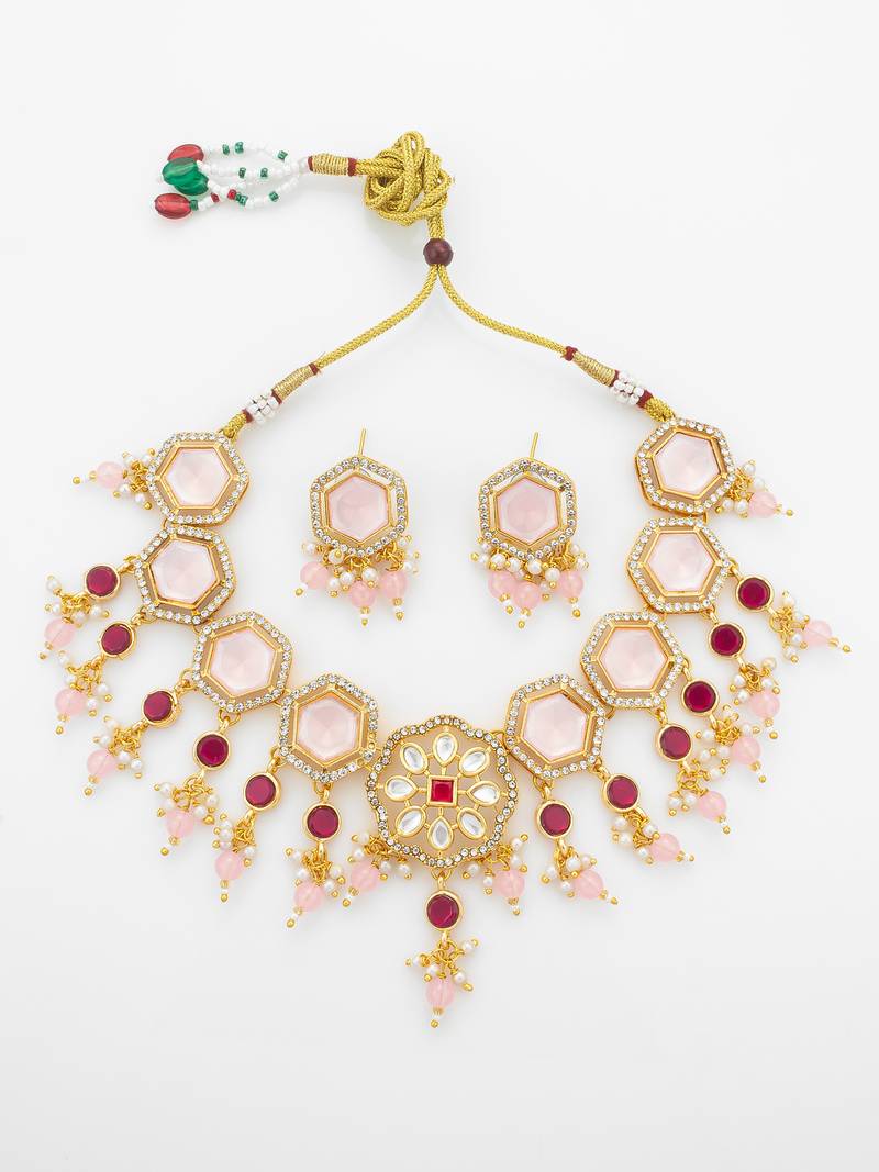 Gold plated kundan necklace set with pink stones end earrings