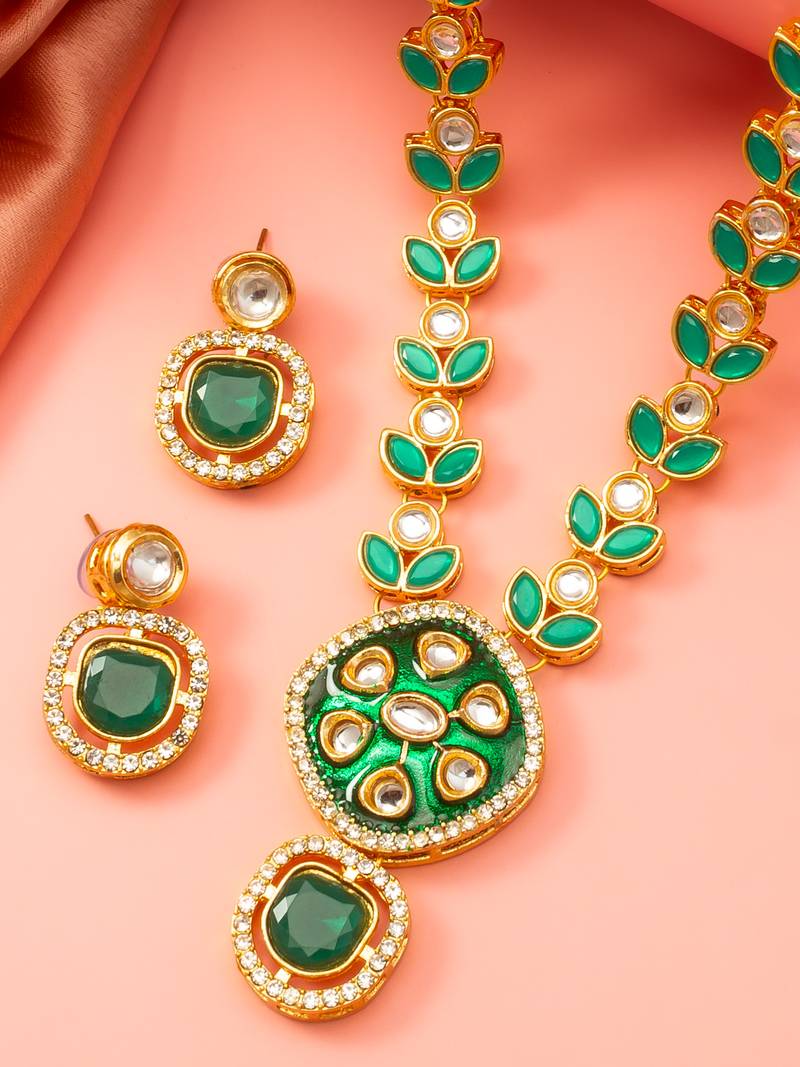 Gold-plated kundan necklace set with green meenakari pendant and pearl chain and earrings