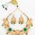 Gold-plated kundan choker necklace set with peach and green stones