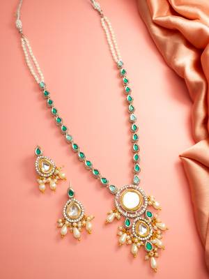 Silver-plated kundan necklace set with green stones and pearl drops 2