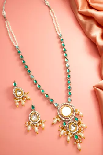 Silver-plated kundan necklace set with green stones and pearl drops