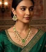 Green meenakari kundan double-layer choker necklace set with pearl drops and chandbali earrings