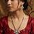 kundan long necklace set with ruby-tone stones and pearl drops