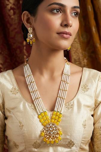 Yellow beaded kundan long necklace set with chandbali-style earrings