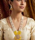 Yellow beaded kundan long necklace set with chandbali-style earrings