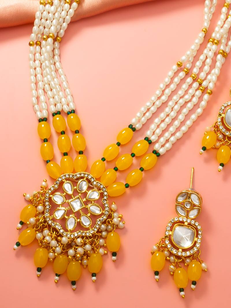 Yellow beaded kundan long necklace set with chandbali-style earrings