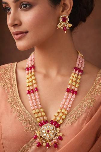 Pink and yellow beaded multi-strand kundan pendant necklace set with matching earrings