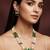 Gold plated long pearl necklace set with green stone pendant and earrings