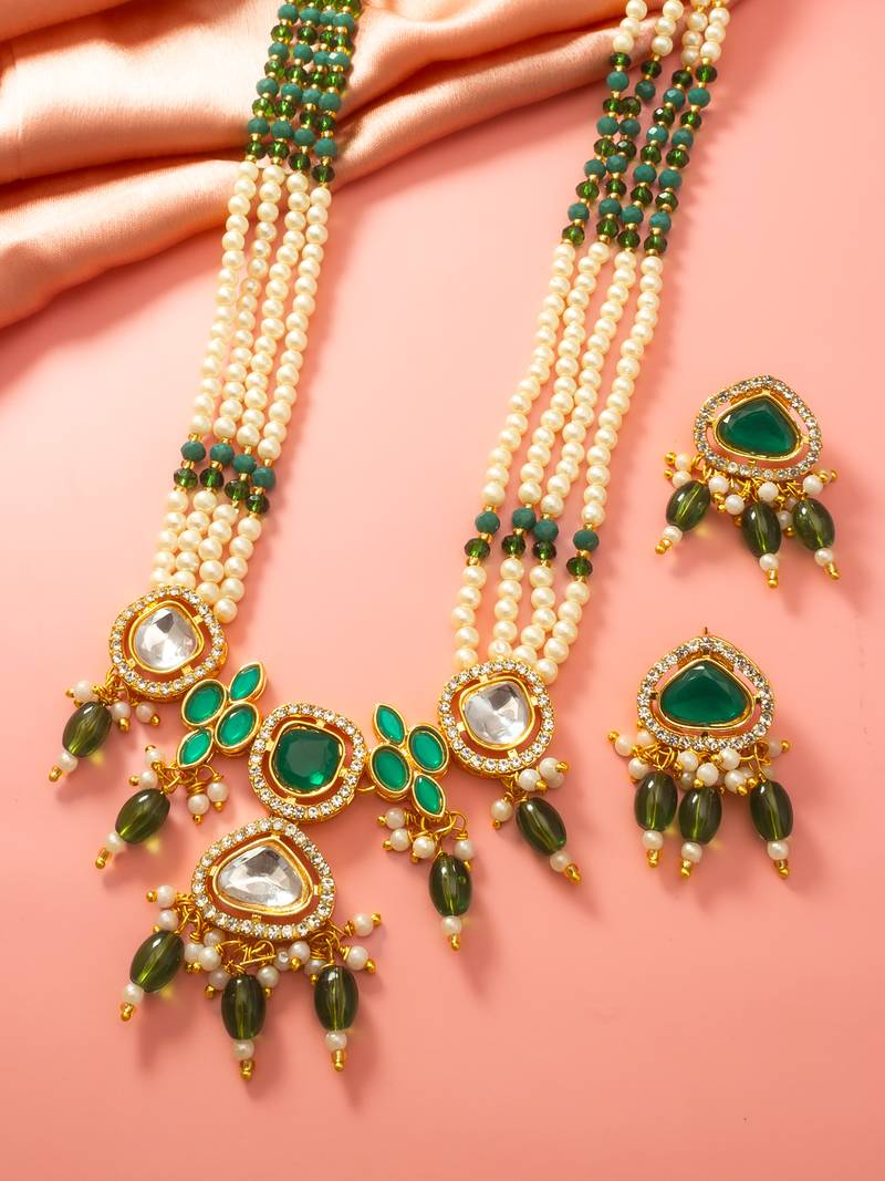 Gold plated long pearl necklace set with green stone pendant and earrings