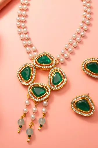 Gold plated pendant pearl necklace set with green stone and ad earrings