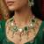 Gold plated green and white kundan statement necklace set