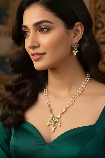 Double strand pearl gold plated necklace with floral kundan pendant