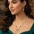 Double strand pearl gold plated necklace with floral kundan pendant