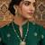 Gold plated green stone kundan necklace with circular pendant