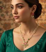 Gold plated double layered pearl chain necklace with floral pendant