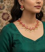 Gold plated pink floral kundan necklace set with pearl clusters
