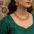 Gold plated pink floral kundan necklace set with pearl clusters