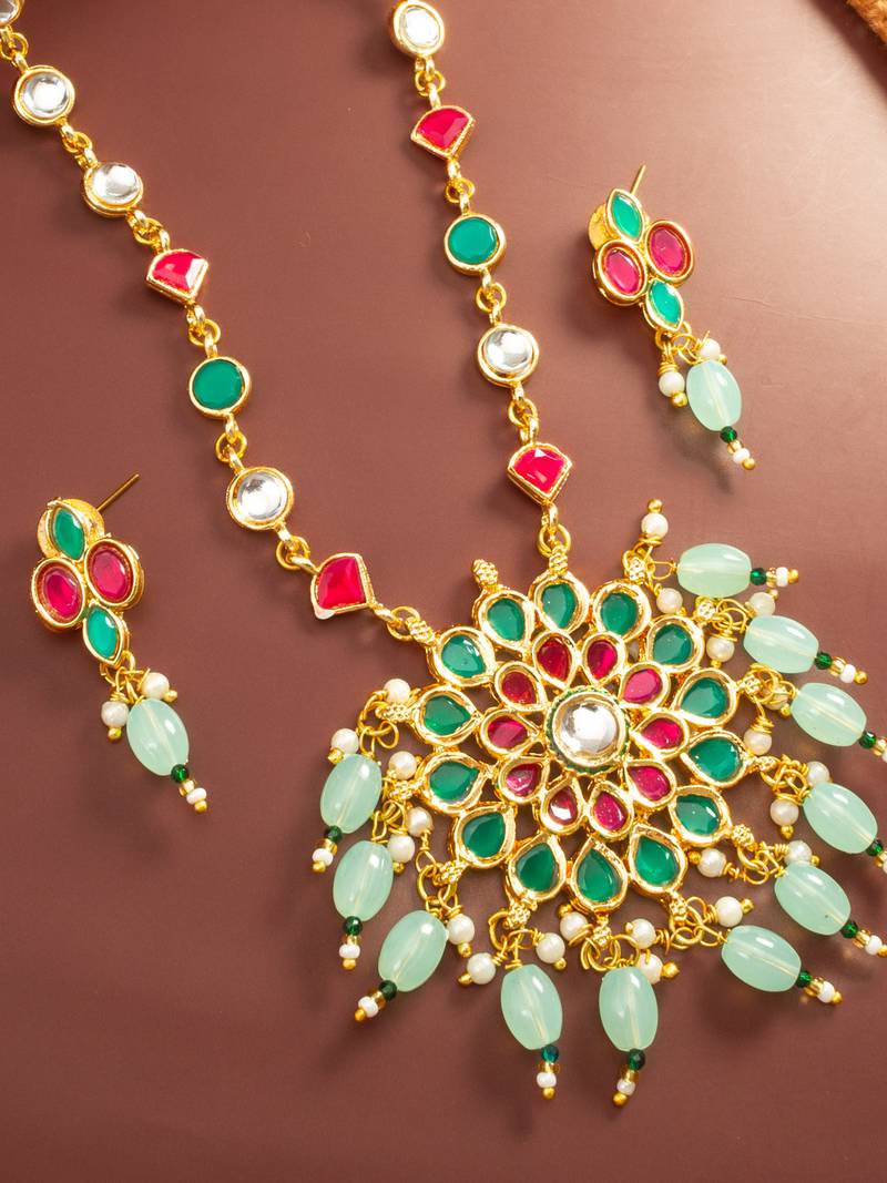 Gold plated kundan necklace set with green and pink stones and bead droplets