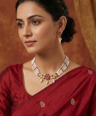 Gold plated multi-strand pearl necklace with red stone detail 1