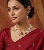 Gold plated multi-strand pearl necklace with red stone detail