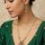 Gold plated double layered pearl necklace with floral accents