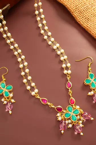Gold plated double layered pearl necklace with floral accents
