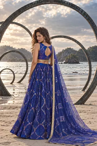 LAVENDER NET THREAD WITH ZARI AND SEQUIN WORK FESTIVE LEHENGA CHOLI