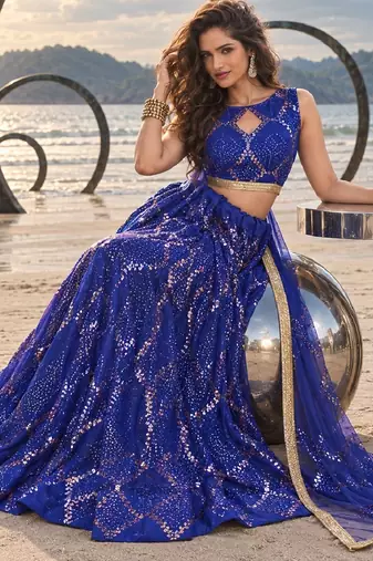LAVENDER NET THREAD WITH ZARI AND SEQUIN WORK FESTIVE LEHENGA CHOLI