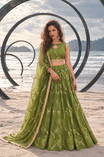 DARK LEAF GREEN NET THREAD WITH ZARI AND SEQUIN WORK FESTIVE LEHENGA CHOLI