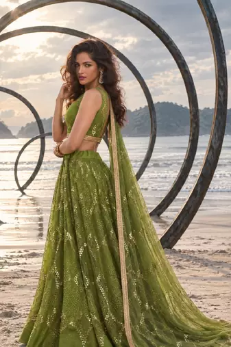 DARK LEAF GREEN NET THREAD WITH ZARI AND SEQUINCE WORK FESTIVE LEHENGA CHOLI SET FOR WOMEN'S