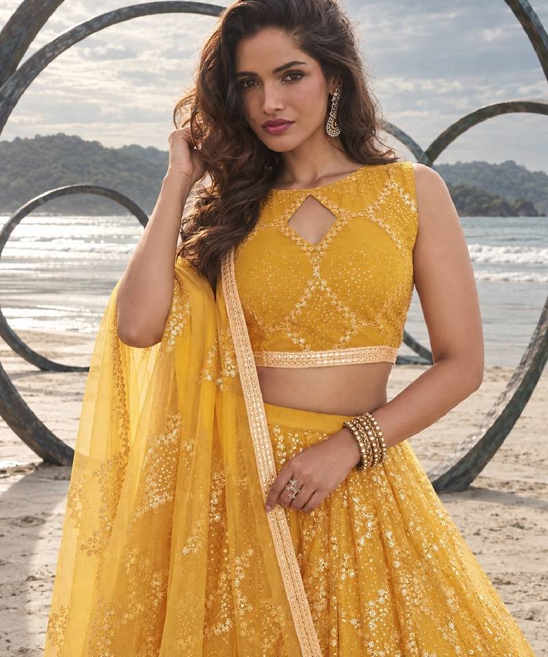 MUSTARD YELLOW NET THREAD WITH ZARI AND SEQUINCE WORK FESTIVE LEHENGA CHOLI SET FOR WOMEN'S