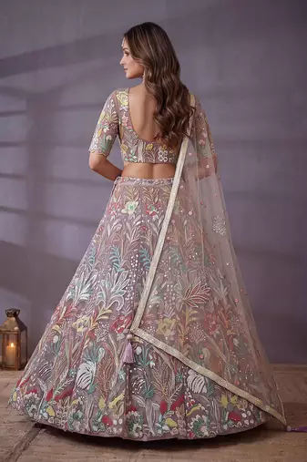Fantastic Lavender Sequins Net Engagement Wear Lehenga Choli