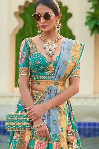 Turquoise Print Stones & Sequins Na Semi Stitched Lehenga Set