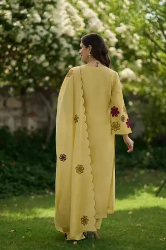 Yellow embroidered chanderi silk kurta pant set with hand kodi lace and dupatta