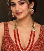 Red and cream kundan pearl layered necklace set