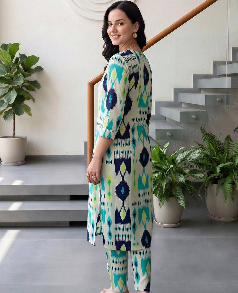women printed regular cotton kurta with trousers