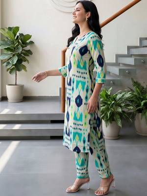women printed regular cotton kurta with trousers 4