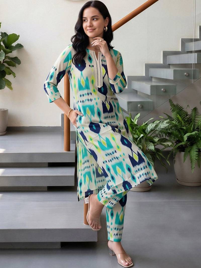 women printed regular cotton kurta with trousers