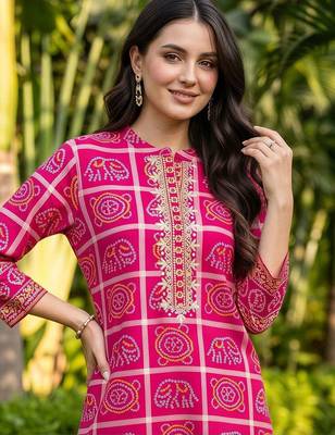 women ethnic motifs printed regular cotton kurta with trousers 6