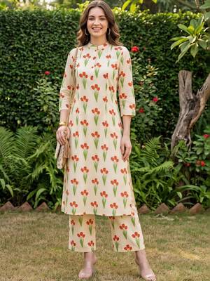 women floral printed regular cotton kurta with trousers 1