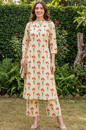 women floral printed regular cotton kurta with trousers