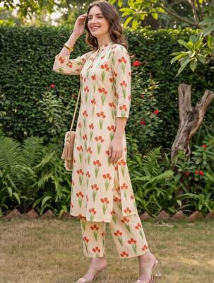 women floral printed regular cotton kurta with trousers 4