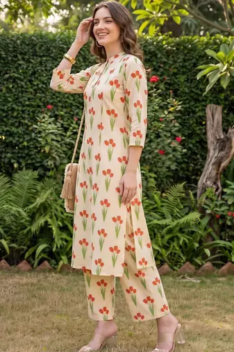 women floral printed regular cotton kurta with trousers