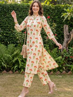 women floral printed regular cotton kurta with trousers 5