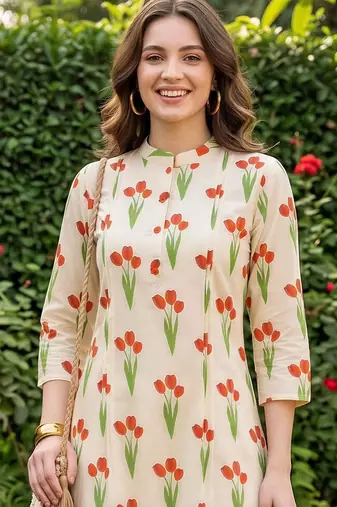 women floral printed regular cotton kurta with trousers