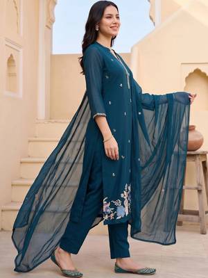women floral embroidered regular thread work cotton kurta with trousers & with dupatta 4