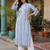 women printed regular cotton kurta with trousers